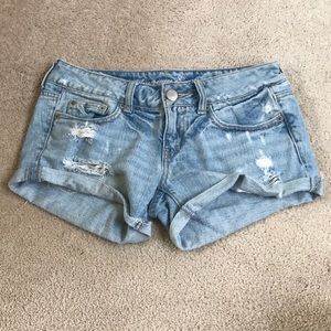 white washed ripped American Eage jean shorts